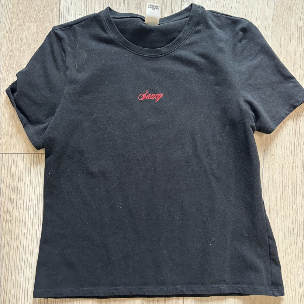Black T-Shirt with Saucy on it